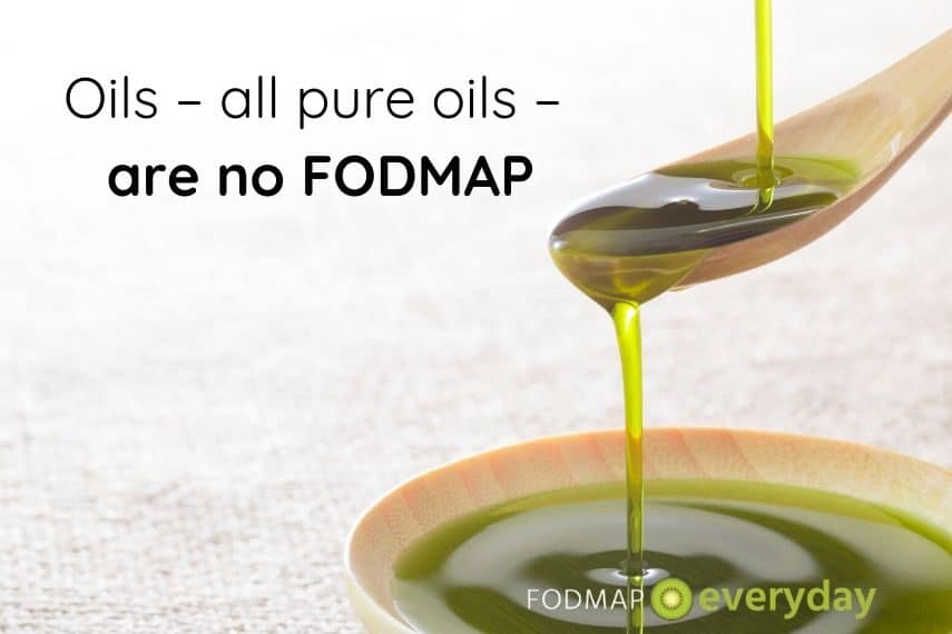 olive oil pouring off of a spoon into a bowl