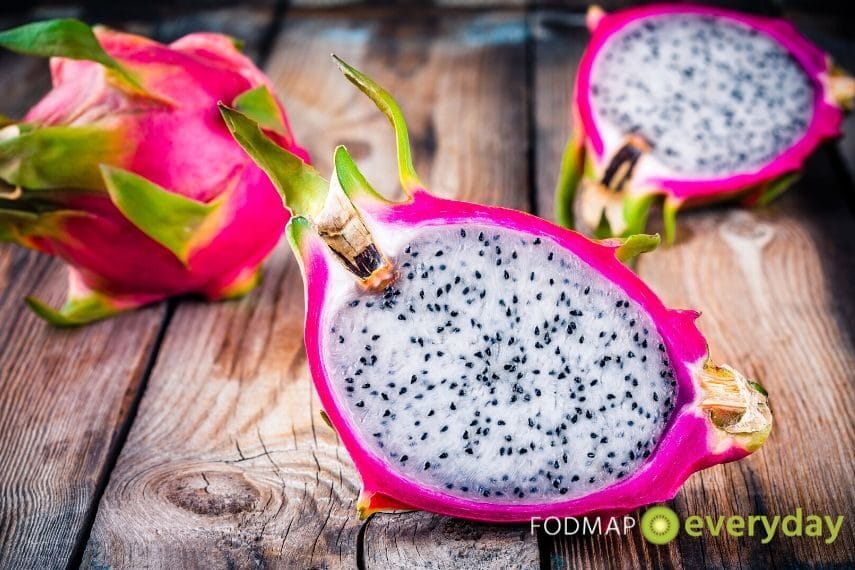 sliced dragon fruit on a wooden board