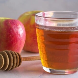 apples & honey against a white backdrop