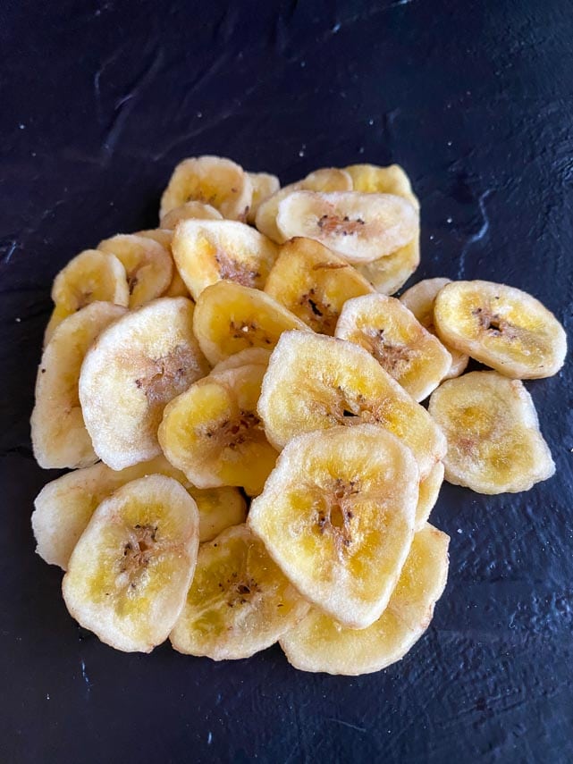 banana chips on dark surface