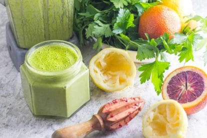 Citrus Herb Mojo ingredients with blender in background