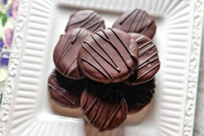 closeup of Low FODMAP Thin Mint Cookies piled on square white plate.