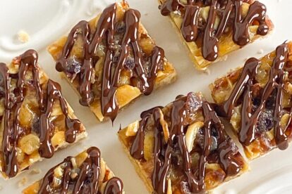 diagonal closeup of Low FODMAP Florentine Bars on a decorative white platter