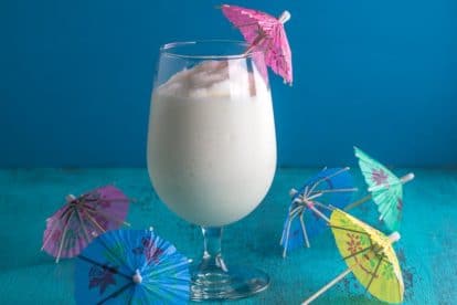 frosty low fodmap pina colada with paper parasols