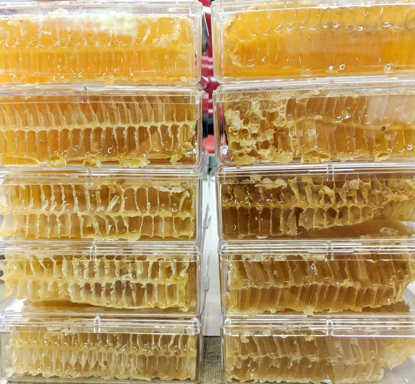 honeycomb in clear boxes, stacked on top of one another