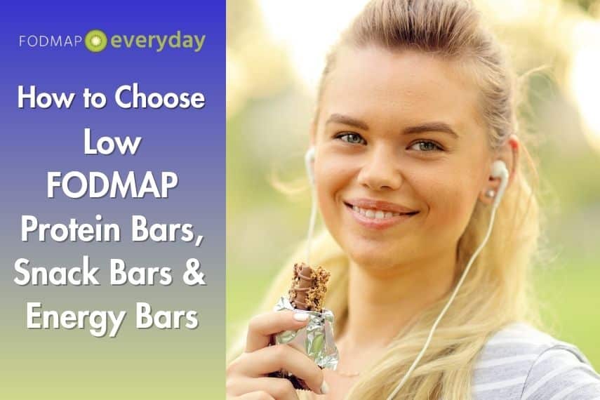 Young woman smiling holding a snack bar.