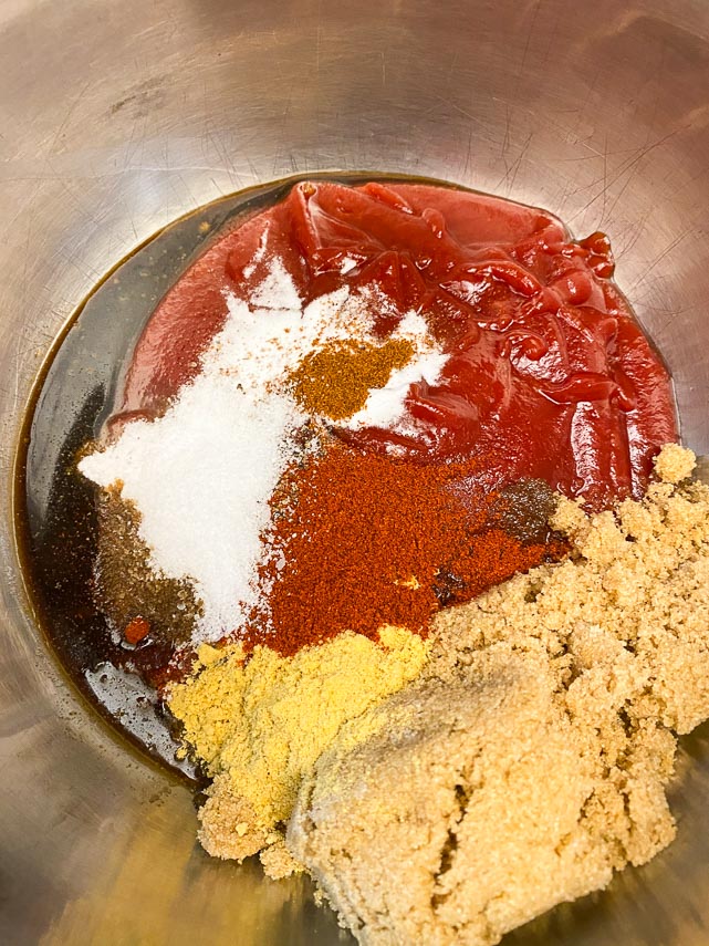 Ingredients for Blackberry BBQ sauce in saucepan, ready to be whisked together