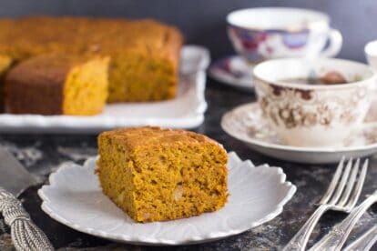 low FODMAP triple ginger pumpkin cake on plate; forks alongside
