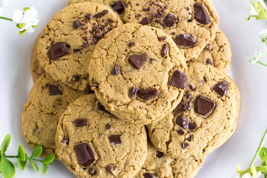 overhead image of Low FODMAP Chewy Peanut Butter Chocolate Chunk Cookies on white plate