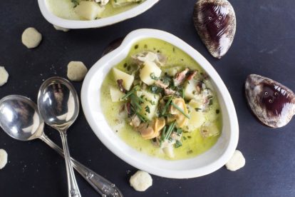 overhead view of low FODMAP clam chowder in a clam shaped dish