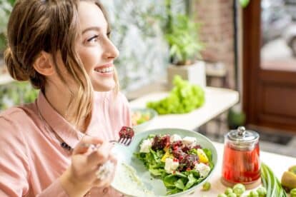 woman eating salad