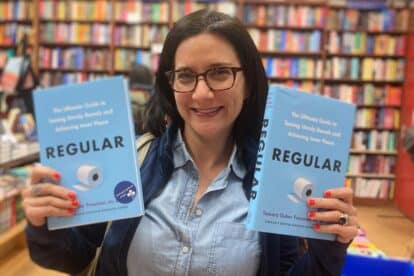 Tamara holding 2 books