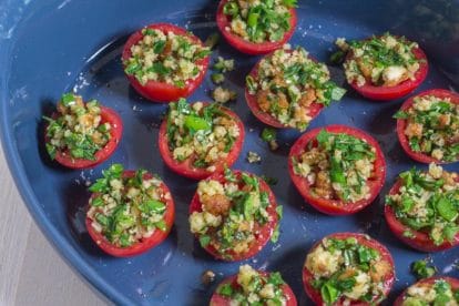 tomatoes Provencal in blue casserole dish before roasting