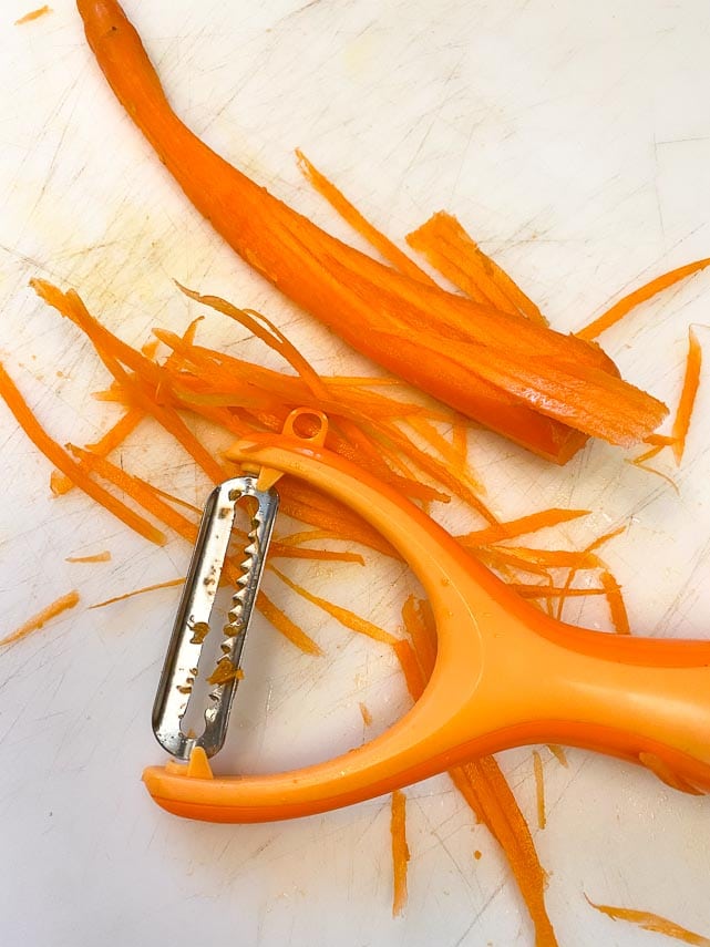 using a hand held julienne peeler using a hand held julienne peeler