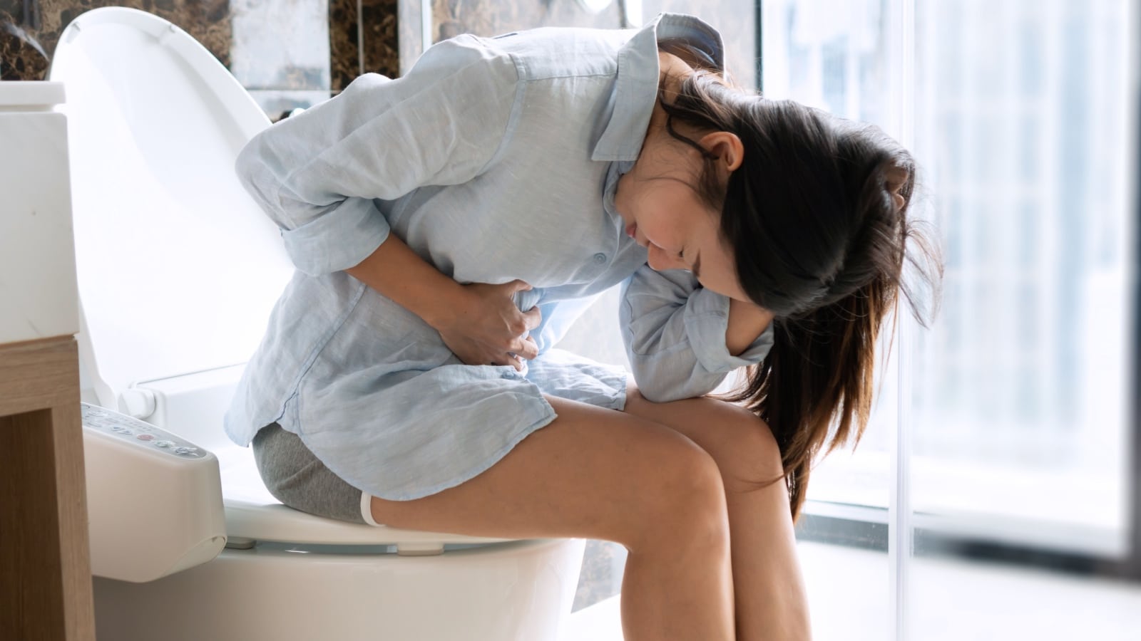 woman on toilet. 