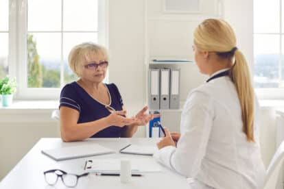 woman talking to doctor.