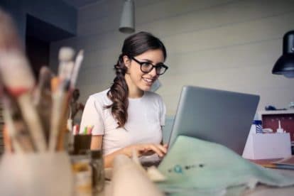 young woman studying on computer